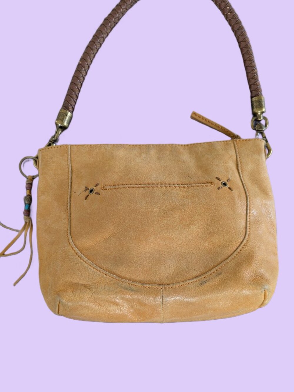 The Sak tan Leather hobo bag with a braided leather strap